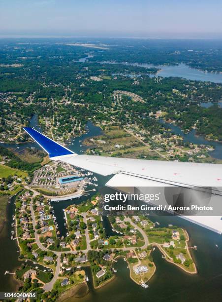 wing of airplane during flight, poquoson, virginia, united states - poquoson stock pictures, royalty-free photos & images
