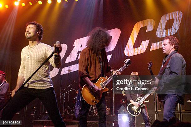 Paul Rodgers, Slash, Dave Colwell, and Neal Schon in concert at the Grove of Anaheim.