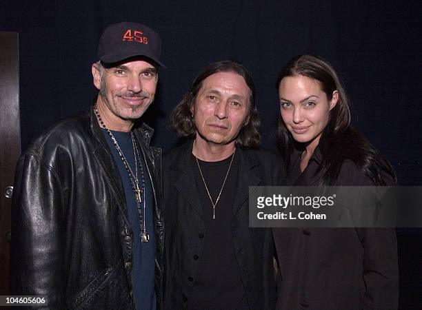 Billy Bob Thornton, Angelina Jolie join John Trudell backstage after his concert to celebrate the release of his album"Bone Days".Angelina...