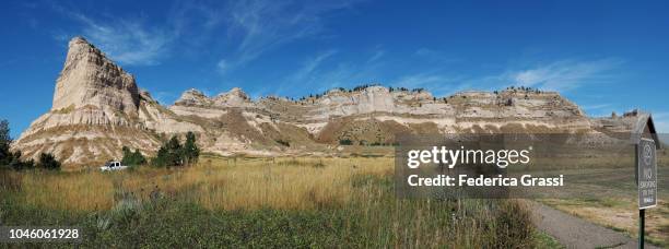 panoramic view of scotts bluff national monument from saddle rock trailhead - scotts bluff national monument stock pictures, royalty-free photos & images