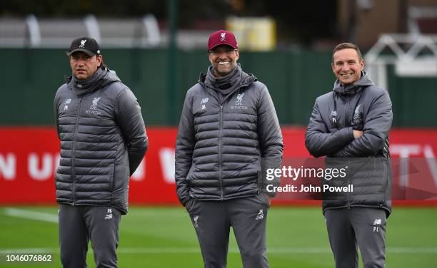 Jurgen Klopp manager of Liverpool Pepijn Lijnders and Peter Krawietz second assistant coach of Liverpool during a training session at Melwood...