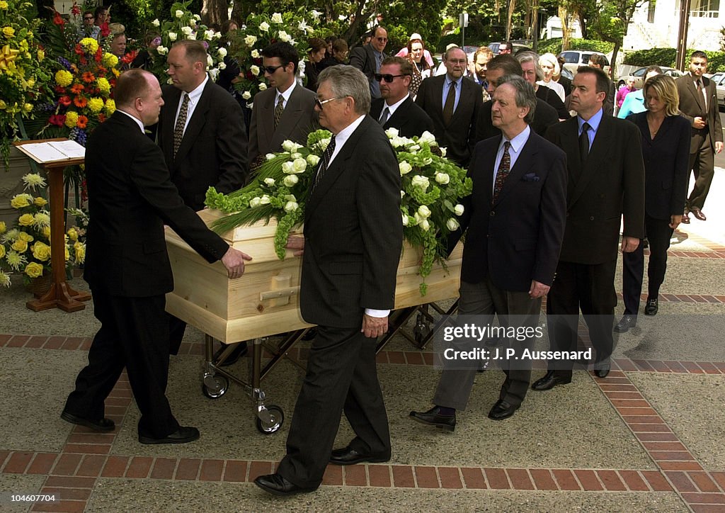Carroll O'Connor's remains are led into St. Paul The Apostle Church