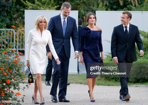 King Felipe of Spain, Queen Letizia of Spain, French President Emmanuel Macron and his wife Brigitte Macron arrive at the Grand Palais to visit the...