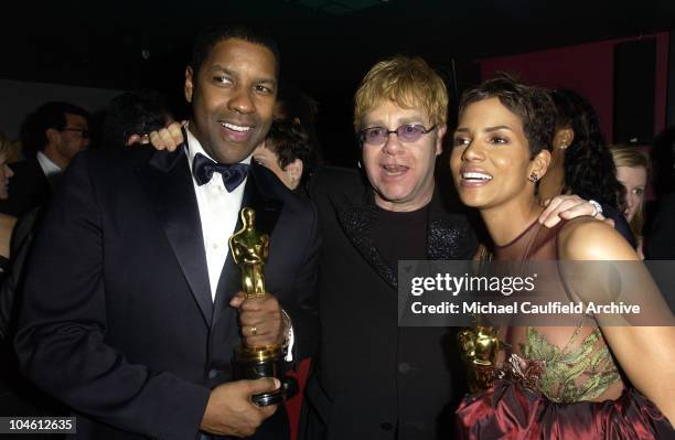 Denzel Washington, Sir Elton John and Halle Berry during The 10th Annual Elton John AIDS Foundation InStyle Party - Inside at Moomba Restaurant in...