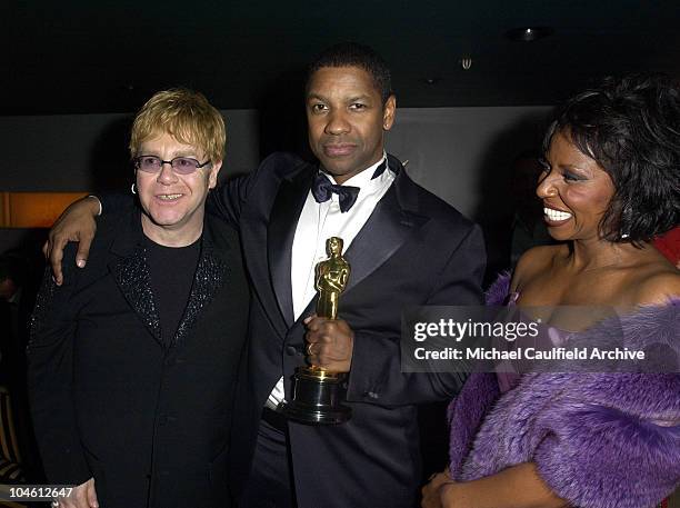 Sir Elton John, Denzel Washington and wife Pauletta Pearson