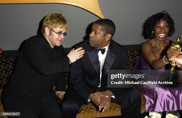 Sir Elton John, Denzel Washington and wife Pauletta Pearson