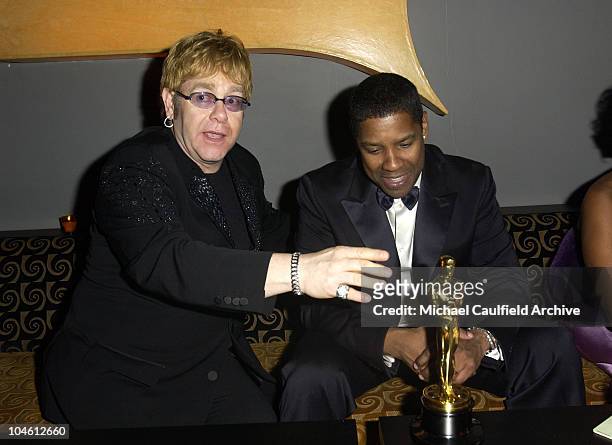 Sir Elton John and Denzel Washington during The 10th Annual Elton John AIDS Foundation InStyle Party - Inside at Moomba Restaurant in Hollywood,...