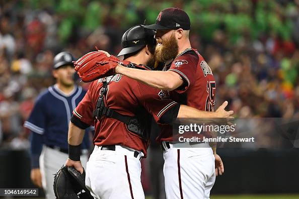 Jeff Mathis and Archie Bradley of the Arizona Diamondbacks celebrate ...
