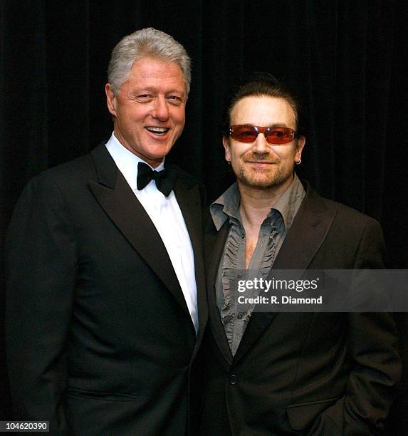 Former President Bill Clinton and Bono during The 45th GRAMMY Awards - MusiCares 2003 Person of the Year - Bono - Inside at Marriott Marquis in New...