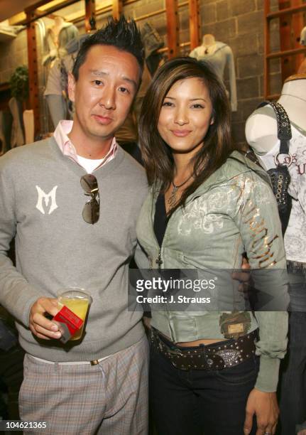 Eric Kim of Monarchy and Kelly Hu during Monarchy Launch at M. Fredric - April 18, 2006 at M.Fredric in Studio City, California, United States.