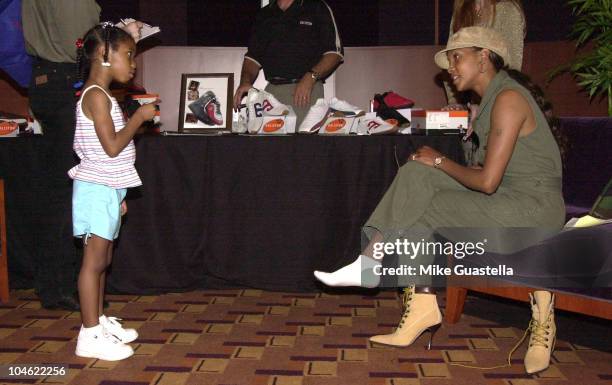 Jamia Simone Nash getting to know Vivica A. Fox during Backstage Creations' Celebrity Gift Retreat for 2003 Essence Awards at Kodak Theatre in...