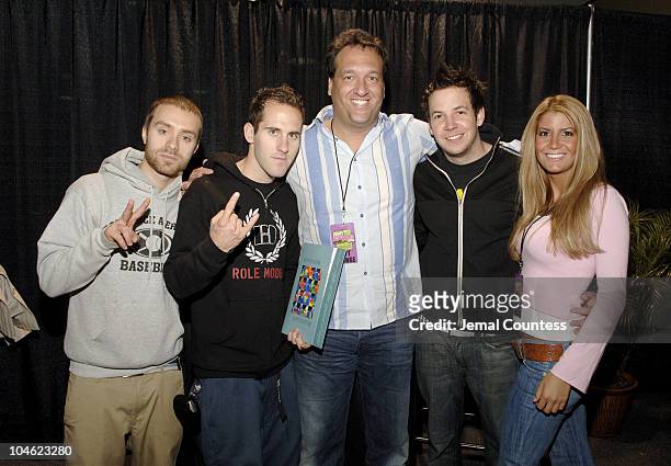 Sebastien Lefebvre, Chuck Comeau and Pierre Bouvier of Simple Plan with Dr. Gary