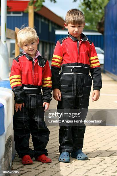 go kart boys - racing suit stock pictures, royalty-free photos & images