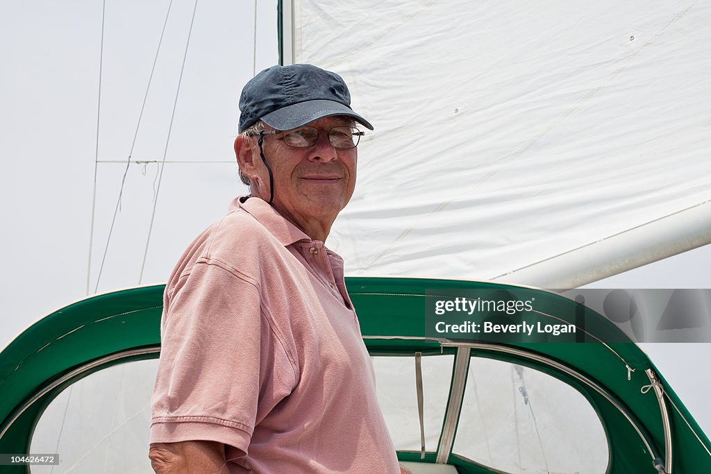 Senior man on sailboat