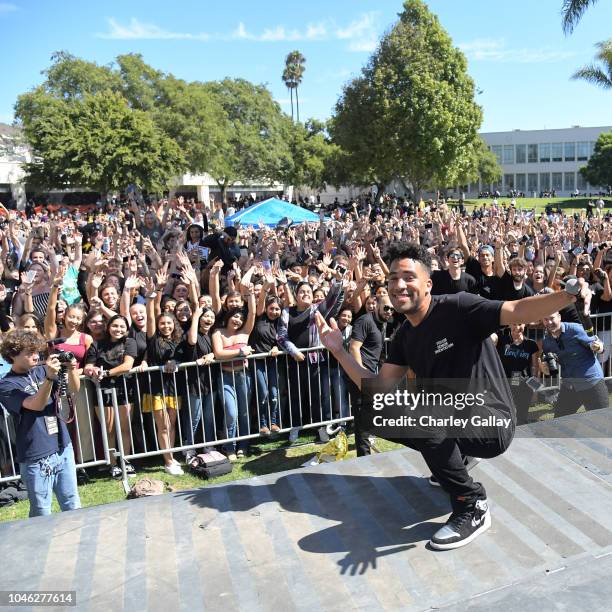 Performs onstage at AXE Senior Orientation at Ventura High School on October 5, 2018 in Ventura, California.