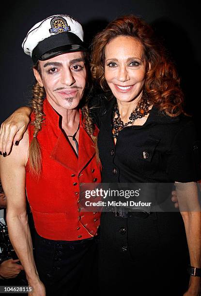 John Galliano and Marisa Berenson attend in backstage the Christian Dior Ready to Wear Spring/Summer 2011 show during Paris Fashion Week at Espace...