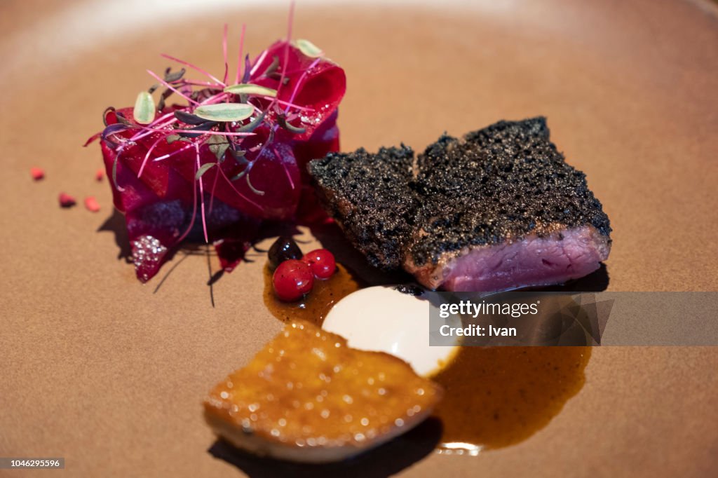 Luxury Cuisine, Main Course, roast ostrich meat,fried foie gras beetroot