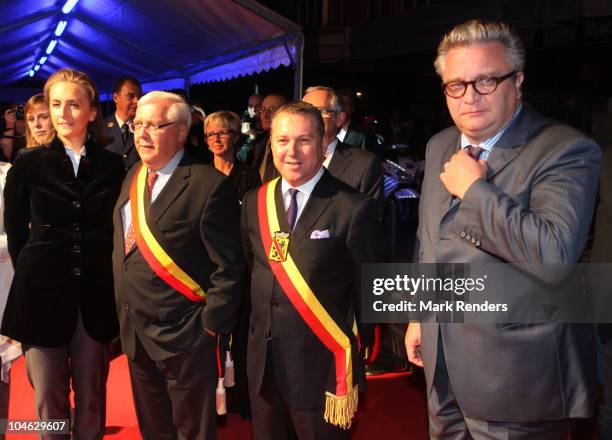 Princess Claire of Belgium, Mayor Jacques Etienne, Governor Dennis Mathen and Prince Laurent of Belgium pose for a photo during the opening night of...