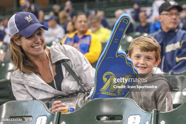 Young fan and his mom came from Memphis to cheer on the Brewers during Game 2 of the 2018 National League Divisional Series between the Milwaukee...