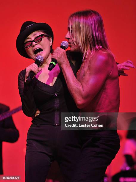 Musicians Yoko Ono and Iggy Pop perform with the "We Are Plastic Ono Band" held at Orpheum Theatre on October 1, 2010 in Los Angeles, California.