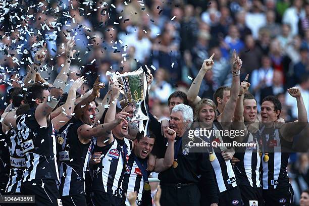 The Magpies hold up the Premiership Cup after winning the AFL Grand Final Replay match between the Collingwood Magpies and the St Kilda Saints at...