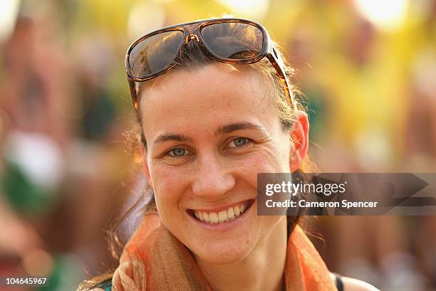 Sophie Edington of Australia smiles during an Australian team Flag Raising ceremony at the Athletes Media Village ahead of the Delhi 2010...