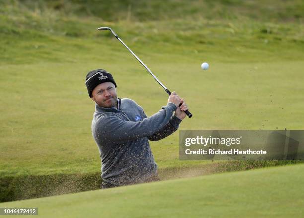 Richard Sterne plays out of a bunker on the third during day three of the 2018 Alfred Dunhill Links Championship at Carnoustie Golf Links on October...