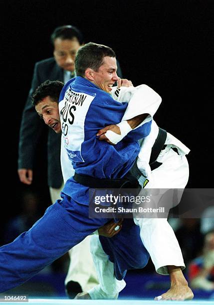 Makrem Ayed of Tunisia in action whilst defeating Adrian Robertson of Australia during the Mens 60 kilogram preliminary Judo event at the Sydney...