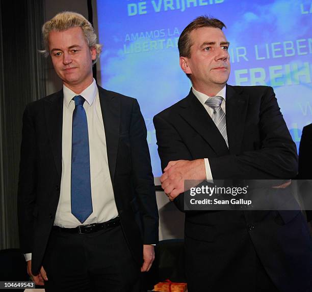 German renegade former Christian Democrat Rene Stadtkewitz and Dutch right-wing politician Geert Wilders stand on stage after Wilders spoke on...