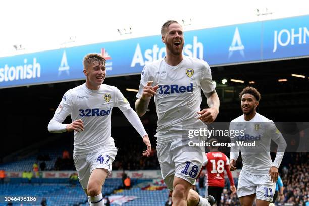 Pontus Jansson of Leeds United celebrates with Jack Clarke and Tyler Roberts scoring the equalising goal to make the score 1-1 during the Sky Bet...