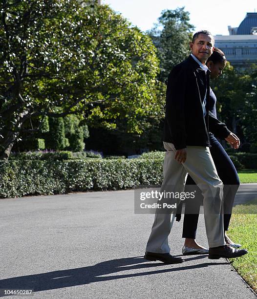 President Barack Obama and first lady Michelle Obama depart from the South Lawn of the White House October 2, 2010 in Washington, DC. The Obamas are...