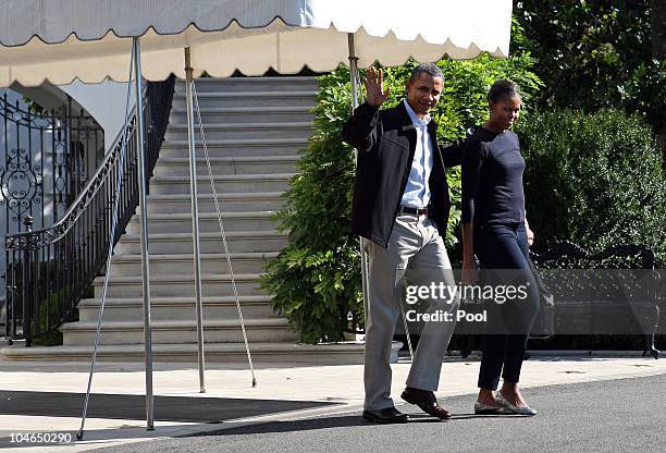 President Barack Obama and first lady Michelle Obama depart from the South Lawn of the White House October 2, 2010 in Washington, DC. The Obamas are...