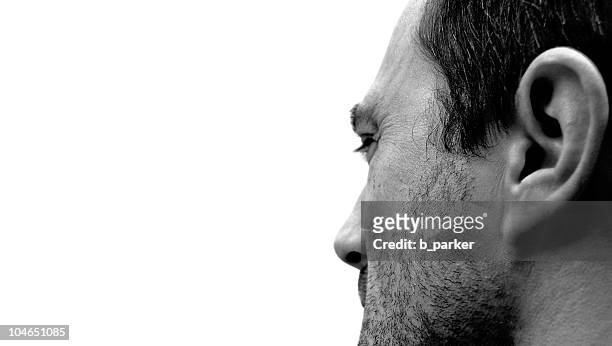 black and white portrait of a man - ear stockfoto's en -beelden