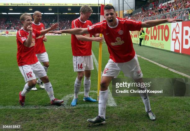 Lewis Holtby, Elkin Soto, André Schuerrle and Ádám Szalai of Mainz celebrate the fourth goal during the Bundesliga match between FSV Mainz 05 and...