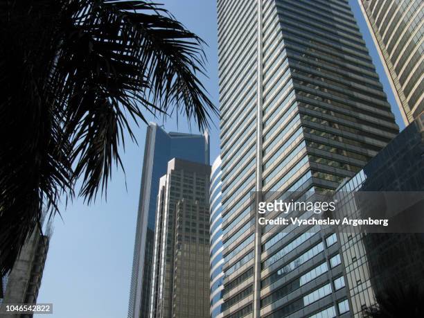 business and financial centre, ayala avenue office towers and skyscrapers, makati central business district, manila, philippines - central avenue stock pictures, royalty-free photos & images