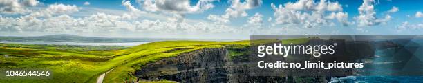 panorama of cliffs of moher in ireland - ireland travel stock pictures, royalty-free photos & images
