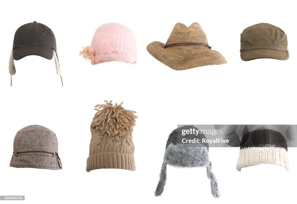 Rows of different kinds of hats against white background