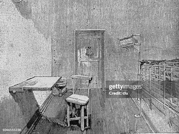 a modern prison cell - small table stock illustrations