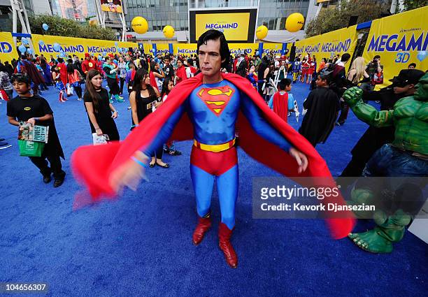 Christopher Dennis dressed as a costumed supehero Superman joins over 1,580 costumed superheroes to break the Guinness World Record for the largest...