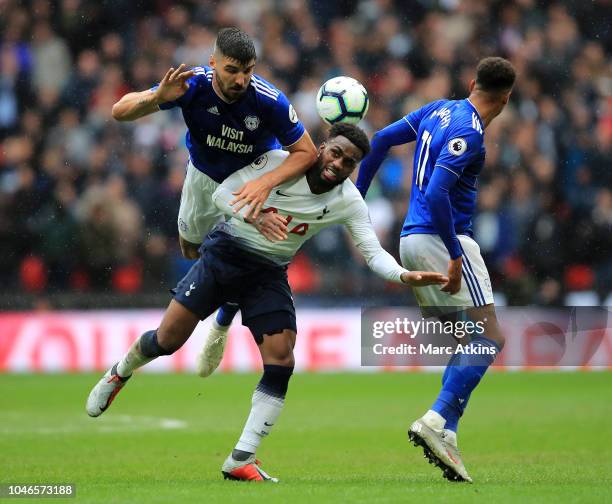 Callum Paterson of Cardiff City competes for a header with Danny Rose of Tottenham Hotspur during the Premier League match between Tottenham Hotspur...