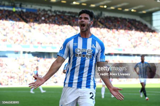 Christopher Schindler of Huddersfield Town celebrates after scoring his team's first goal during the Premier League match between Burnley FC and...