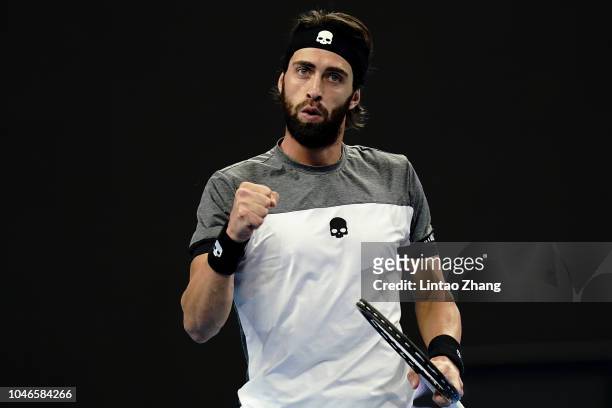 Nikoloz Basilashvili of Georgia celebrates after defeating Kyle Edmund of Great Britain during his Men's Singles Semifinals match in the 2018 China...
