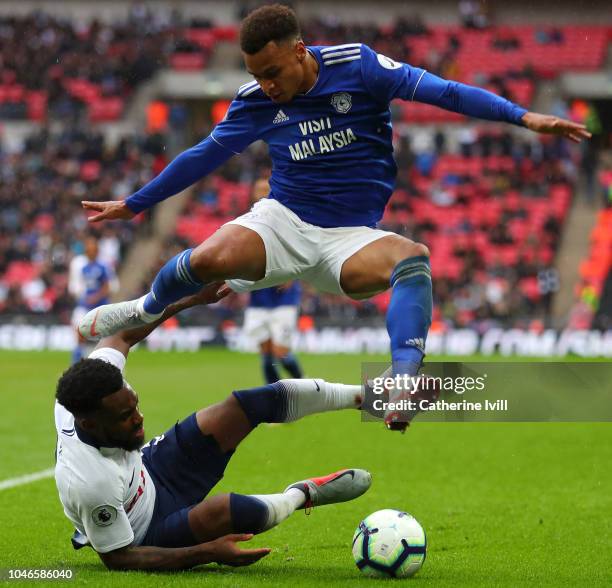 Josh Murphy of Cardiff City is challenged by Danny Rose of Tottenham Hotspur during the Premier League match between Tottenham Hotspur and Cardiff...