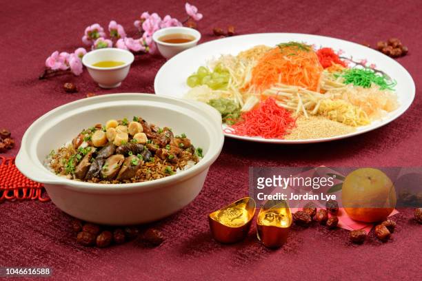 chinese new year dish - yee sang and fried rice - 2018 chinese new year stock pictures, royalty-free photos & images