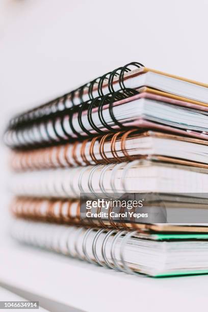 stacking of ring notebooks.closeup - nachschlagewerk stock-fotos und bilder