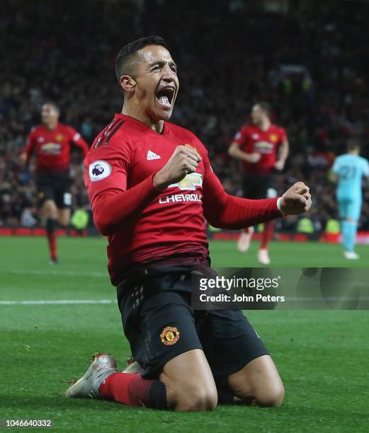 Alexis Sanchez of Manchester United celebrates scoring their third goal during the Premier League match between Manchester United and Newcastle...