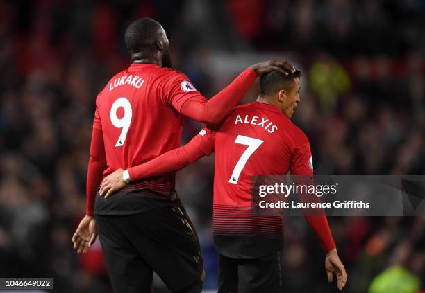 Romelu Lukaku and Alexis Sanchez of Manchester United celebrate following their sides victory in the Premier League match between Manchester United...