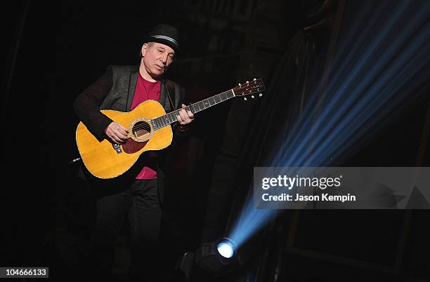 Musician Paul Simon performs onstage at Comedy Central's Night Of Too Many Stars: An Overbooked Concert For Autism Education at the Beacon Theatre on...