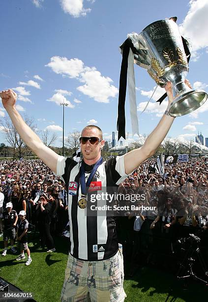 Magpies captain Nick Maxwell holds the Premiership Cup aloft during the Collingwood Magpies AFL Grand Final reception at Gosch's Park on October 3,...