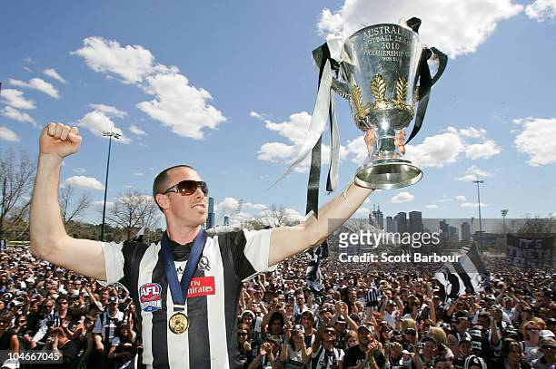Magpies captain Nick Maxwell holds the Premiership Cup aloft during the Collingwood Magpies AFL Grand Final reception at Gosch's Park on October 3,...